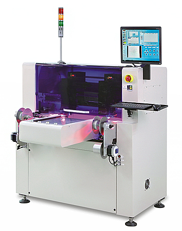 Reel-to-reel pick and place assembly machine with dual material reels and operator console