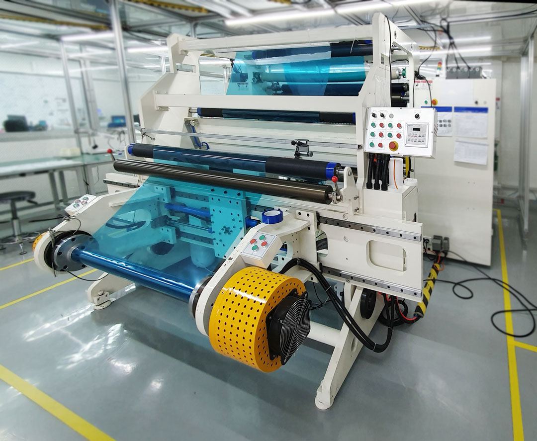 Cleanroom slitter rewinder processing blue protective film with static control