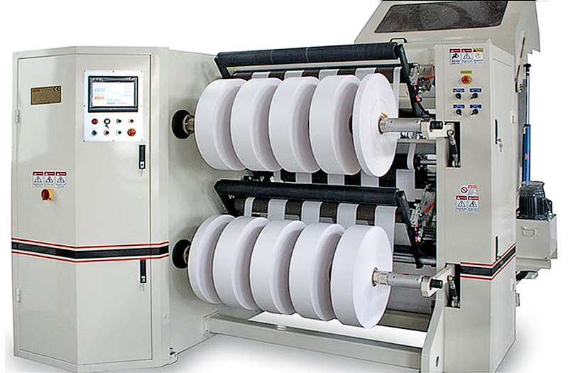 Rewind slitting machine with multiple narrow-width rolls on dual shafts